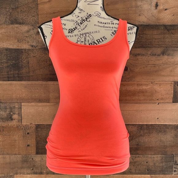 lululemon athletica Tops - Lululemon Slim Fitting Orange Tank Top With Back Mesh Stripe and Pocket Size 0/2